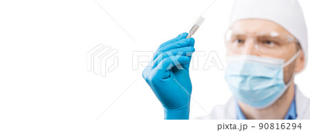 Doctor holding a viol with vaccine against corona virus. 90816294