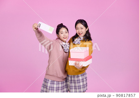mz generation, asian girl students with gift boxes and examinations 90817857