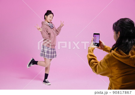 mz generation, asian girl students who shoot short forms photos images 90817867