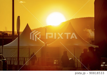 orange, soft, defocused image of a city tent camp for police officers orange, soft, defocused image of a city tent camp for police officers 90818533