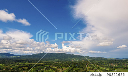Beautiful landscape mountain green field grass meadow white cloud blue sky on sunny day. Majestic green scenery big mountain hill cloudscape valley panorama view in countryside greenery pasture Beautiful landscape mountain green field grass meadow white cloud blue sky on sunny day. Majestic green scenery big mountain hill cloudscape valley panorama view in countryside greenery pasture 90821626