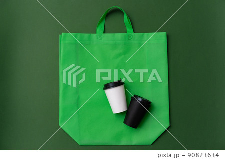 Textile shopping bag and coffee cup flat lay 90823634