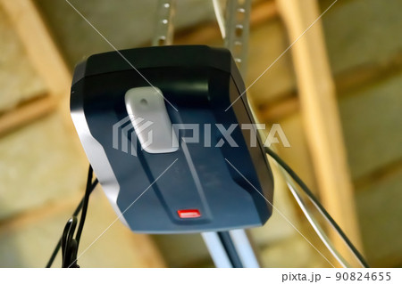 automatic garage door opener electric engine gear mounted on ceiling. automatic garage door opener electric engine gear mounted on ceiling. 90824655