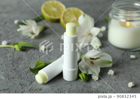 Concept of cosmetic with eco hygienic lipstick on gray textured background 90832345