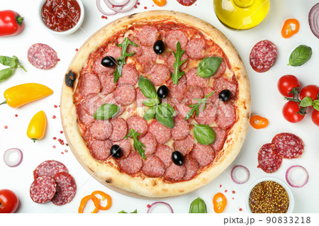 Concept of tasty food with Salami pizza on white background 90833218
