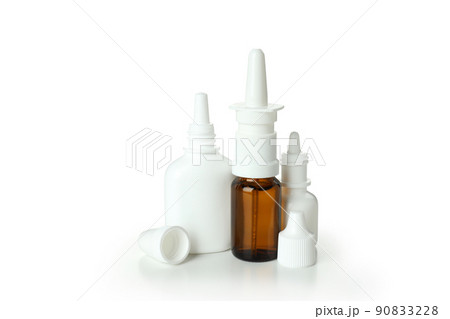 Blank bottles of nasal spray isolated on white background Blank bottles of nasal spray isolated on white background 90833228