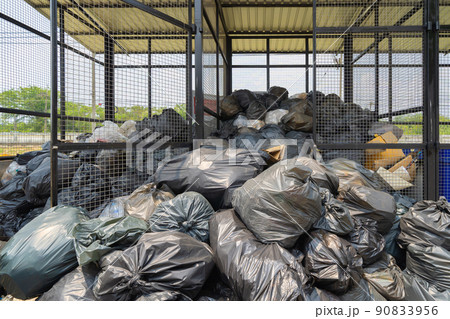 Stack Of Different Types Of Large Garbage Pile, Plastic Bags, And Trash In  Industrial Factory In Environmental Pollution. Waste Disposal In Dumping  Site In Urban City. Stock Photo, Picture and Royalty Free