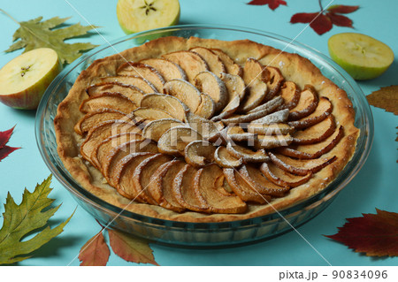 Concept of tasty food with apple pie on blue background 90834096
