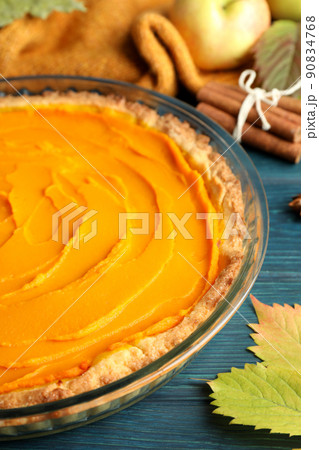 Concept of tasty food with pumpkin pie on wooden background 90834768