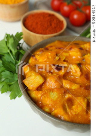 Concept of tasty food with chicken tikka on white background Concept of tasty food with chicken tikka on white background 90834917