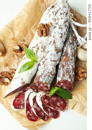 Concept of tasty food with salami sausage Concept of tasty food with salami sausage 90841759