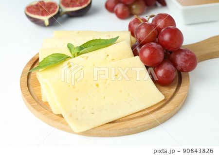 Concept of cooking eating with hard cheese on white background Concept of cooking eating with hard cheese on white background 90843826