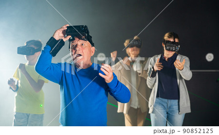 Amazed grandfather in VR club Amazed grandfather in VR club 90852125
