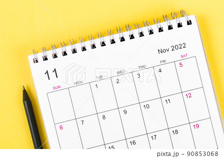 November 2022 desk calendar on yellow background. November 2022 desk calendar on yellow background. 90853068