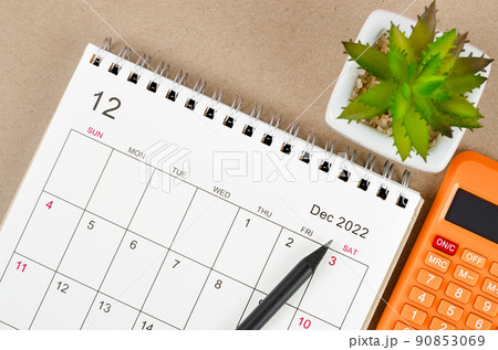 December 2022 desk calendar with calculator. 90853069