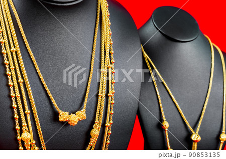 The Necklace display stand with gold necklace on red Velvet fabric. The Necklace display stand with gold necklace on red Velvet fabric. 90853135