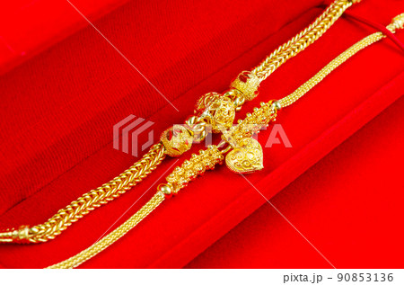 Gold Bracelet in red velvet box container. Gold Bracelet in red velvet box container. 90853136