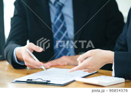 Business people discussing business strategy. 90854376