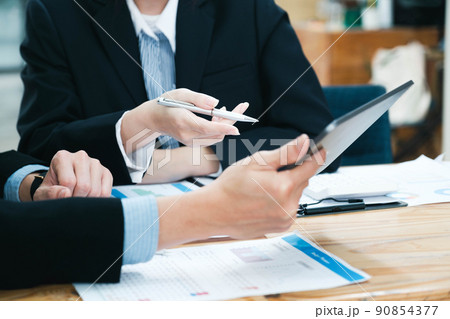 Business people discussing business strategy. 90854377