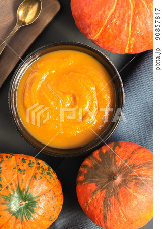 Pumpkin soup puree mashed top view. Vegetable caviar. The concept of healthy eating and vegan food Pumpkin soup puree mashed top view. Vegetable caviar. The concept of healthy eating and vegan food 90857847