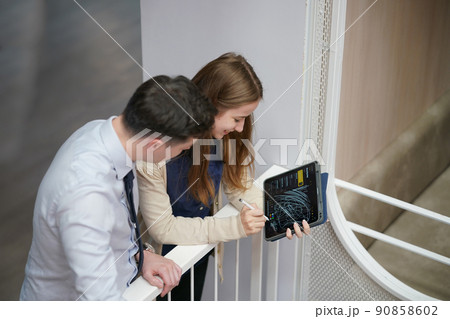 Business people in the workplace are discussing a working strategy for doing business 90858602