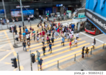 Blur of people cross the road Blur of people cross the road 90860422