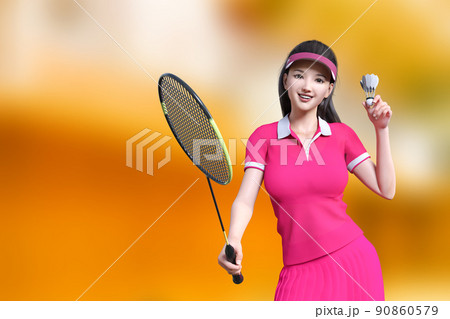 ピンクのユニフォームをきた女性がバトミントンのラケットとシャトルを持って笑顔で立つ 90860579