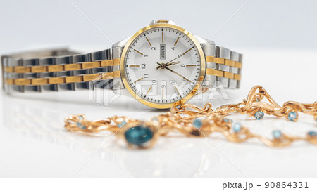 Accessories and jewelry for a fashionable girl : gold ring, necklace and original wristwatch 90864331