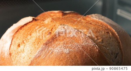 Baking wheat homemade bread in the oven, close-up, selective focus Baking wheat homemade bread in the oven, close-up, selective focus 90865475
