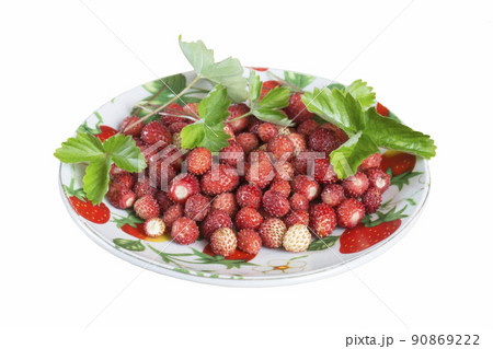Red strawberry in plate on white background Red strawberry in plate on white background 90869222