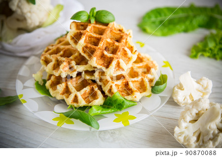 vegetable waffles cooked with cauliflower in a plate 90870088