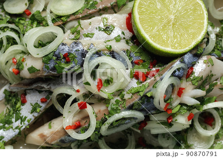 Marinated fillet of mackerel with onions, herbs, lime and chilli. Mediterranean food, appetiser, seafood 90870791