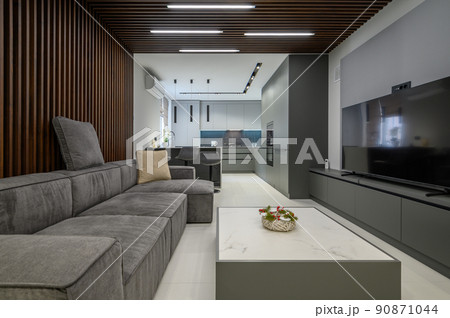 Luxury living room and kitchen in studio apartment 90871044