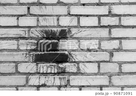 Black dark paint spot brush stain abstract pattern art urban old white brick wall background design monochrome texture 90871091