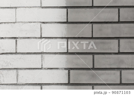 Brick wall paint two colors grey and white abstract urban background design art texture Brick wall paint two colors grey and white abstract urban background design art texture 90871103