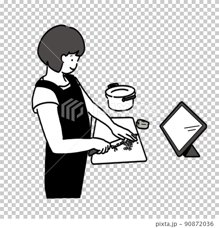 タブレットを見ながら調理をする女性 タブレットを見ながら調理をする女性 90872036