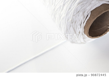 Roll of white rope isolated on white background 90872445