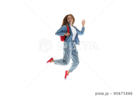 Attractive student girl isolated on white background 90875886