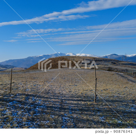 Last good weather days in autumn mountain countryside morning peaceful picturesque scene. Ukrainian Carpathians mountains in far. Last good weather days in autumn mountain countryside morning peaceful picturesque scene. Ukrainian Carpathians mountains in far. 90876341