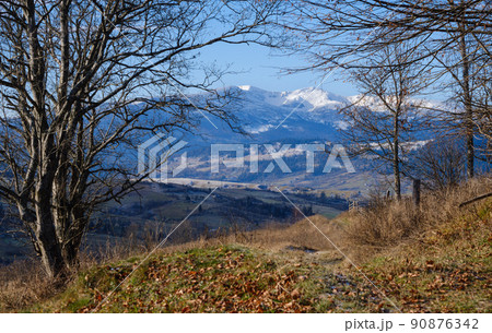 Last good weather days in autumn mountain countryside morning peaceful picturesque scene. Ukrainian Carpathians mountains in far. Last good weather days in autumn mountain countryside morning peaceful picturesque scene. Ukrainian Carpathians mountains in far. 90876342