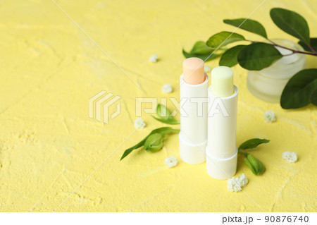Concept of eco face care cosmetic on yellow textured background Concept of eco face care cosmetic on yellow textured background 90876740