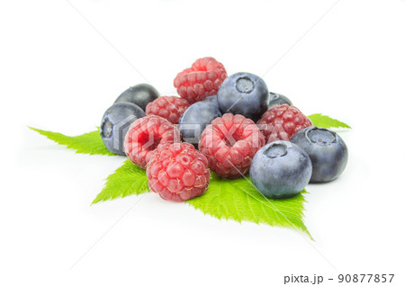 Blueberry and raspberries on white background Blueberry and raspberries on white background 90877857