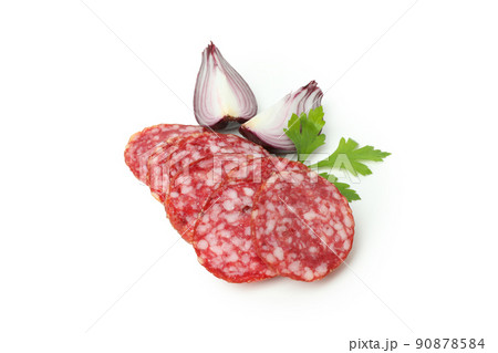 Concept of tasty food with salami sausage on orange background Concept of tasty food with salami sausage on orange background 90878584