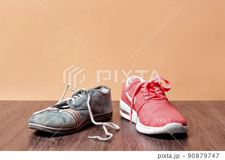 Concept of rich and poor in a , old asneakers and new sneakers Concept of rich and poor in a , old asneakers and new sneakers 90879747