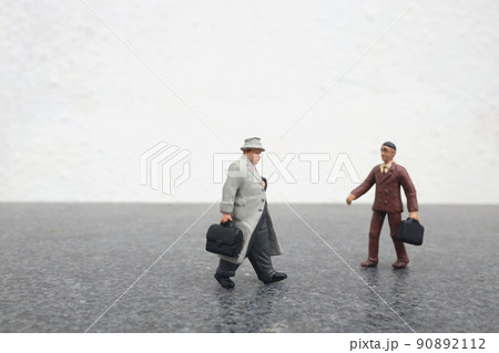 a mini of figure Business team discussing a mini of figure Business team discussing 90892112