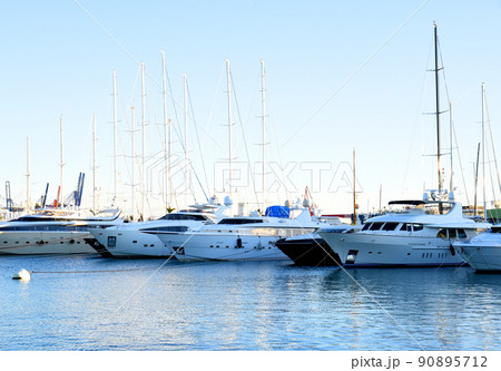 Yachts and motor boats in La Marina de Valencia, Spain. Yachts and motor boats in La Marina de Valencia, Spain. 90895712