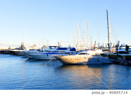 Yachts and motor boats in La Marina de Valencia, Spain. Yachts and motor boats in La Marina de Valencia, Spain. 90895714