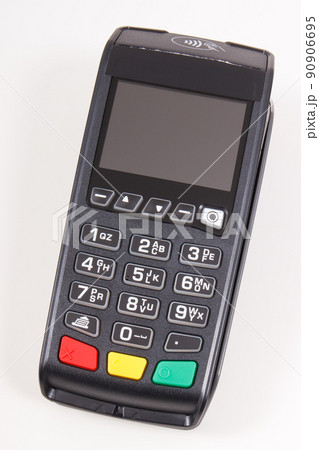 Payment terminal, credit card reader using for cashless paying. Finance concept Payment terminal, credit card reader using for cashless paying. Finance concept 90906695