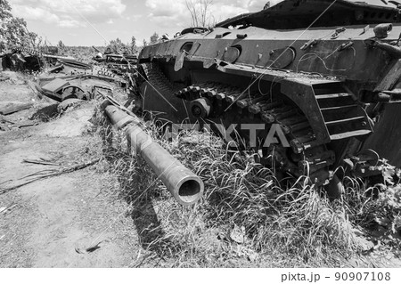 Destroyed military equipment during the war in Ukraine, black and white photo 90907108