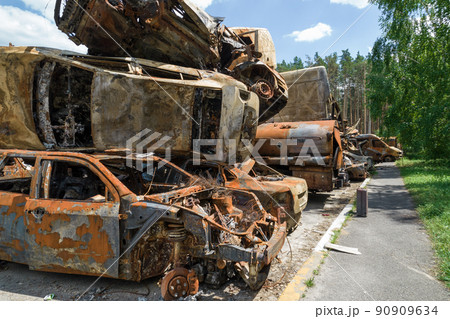 War in Ukraine: a dump of shot and burned cars in Irpin, Bucha district War in Ukraine: a dump of shot and burned cars in Irpin, Bucha district 90909634
